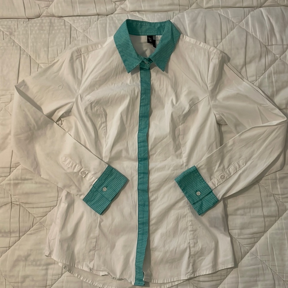 Crisp white button down with teal collar and cuffs